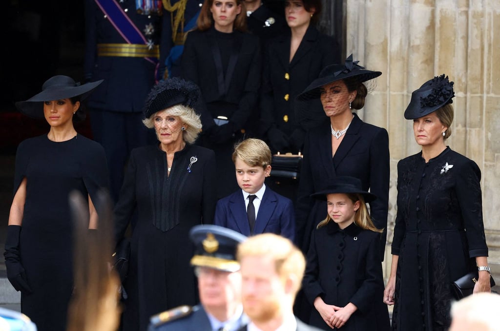 Queen Elizabeth’s daughter-in-laws, granddaughter-in-laws and grandchildren stand outside Westminster Abbey after a service at the state funeral of Queen Elizabeth in London, on September 19. Photo: AFP