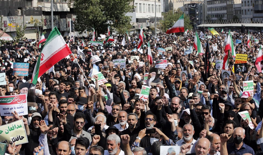 Thousands of Iranians take part in a government support rally against the recent anti-government protests in Iran, after Friday prayers in Tehran, Iran. Photo: EPA-EFE