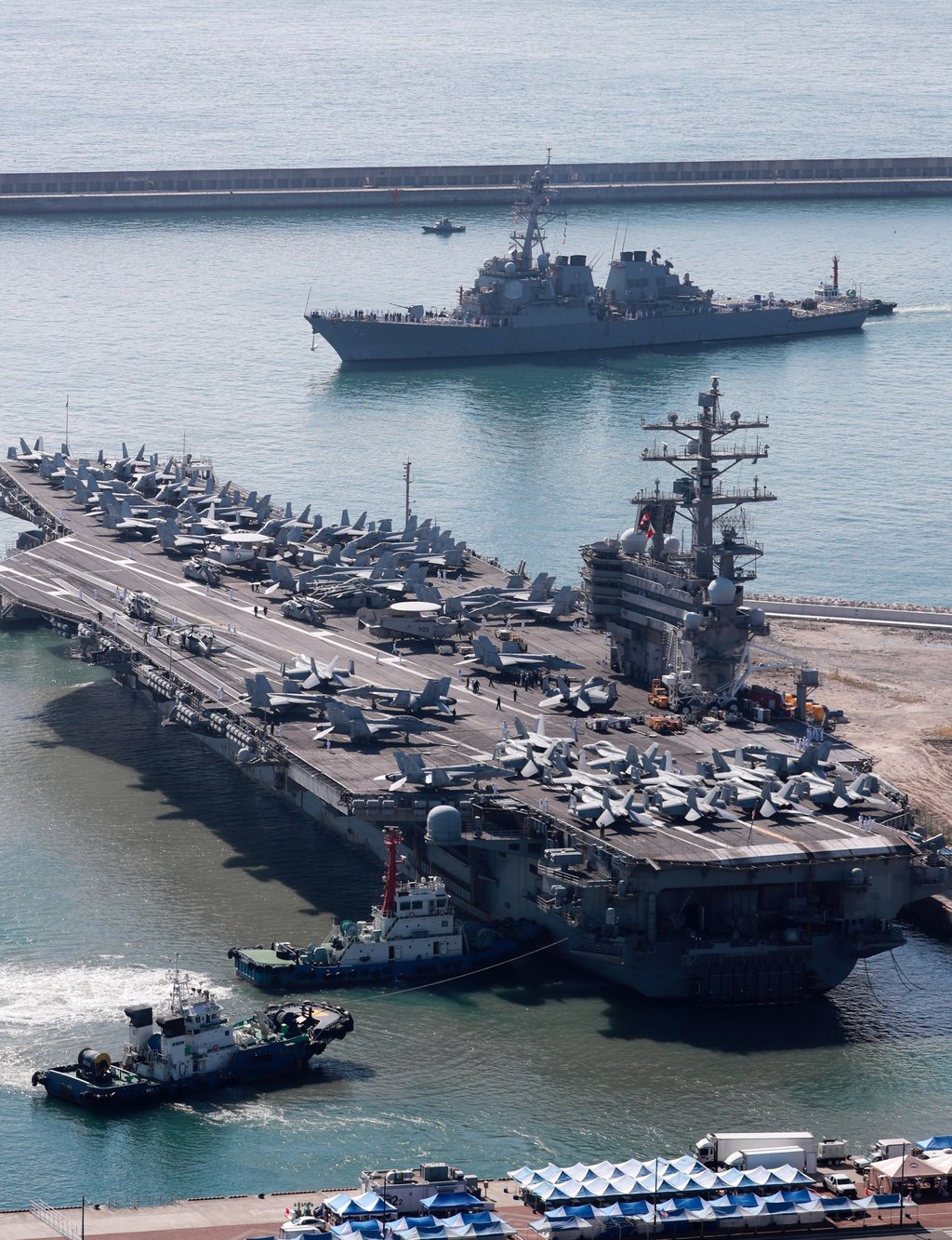 The US nuclear-powered aircraft carrier Ronald Reagan (front) and the US Navy guided missile destroyer Barry (rear) arrive at a naval base in Busan, South Korea on Friday. Photo: EPA-EFE The US nuclear-powered aircraft carrier Ronald Reagan (front) and the US Navy guided missile destroyer Barry (rear) arrive at a naval base in Busan, South Korea on Friday. Photo: EPA-EFE