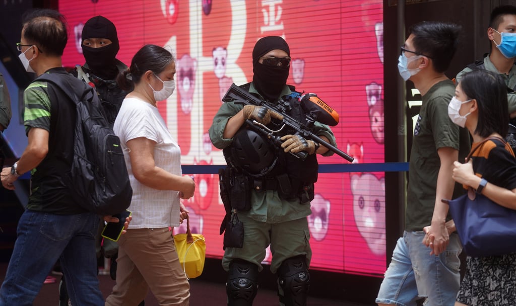 Hong Kong man pleads guilty to wounding with intent for stabbing police ...