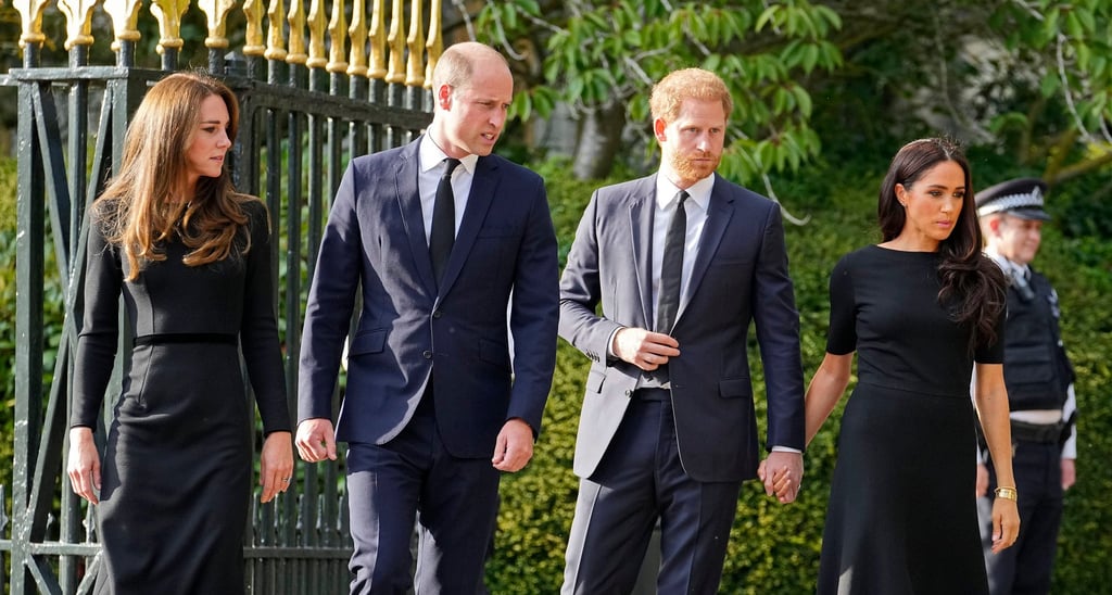Britain’s Prince William and Kate, Princess of Wales and Britain’s Prince Harry and Meghan, Duchess of Sussex leave the gate to view the floral tributes for the late Queen Elizabeth outside Windsor Castle, in Windsor, England, on September 10. Photo: AP Photo