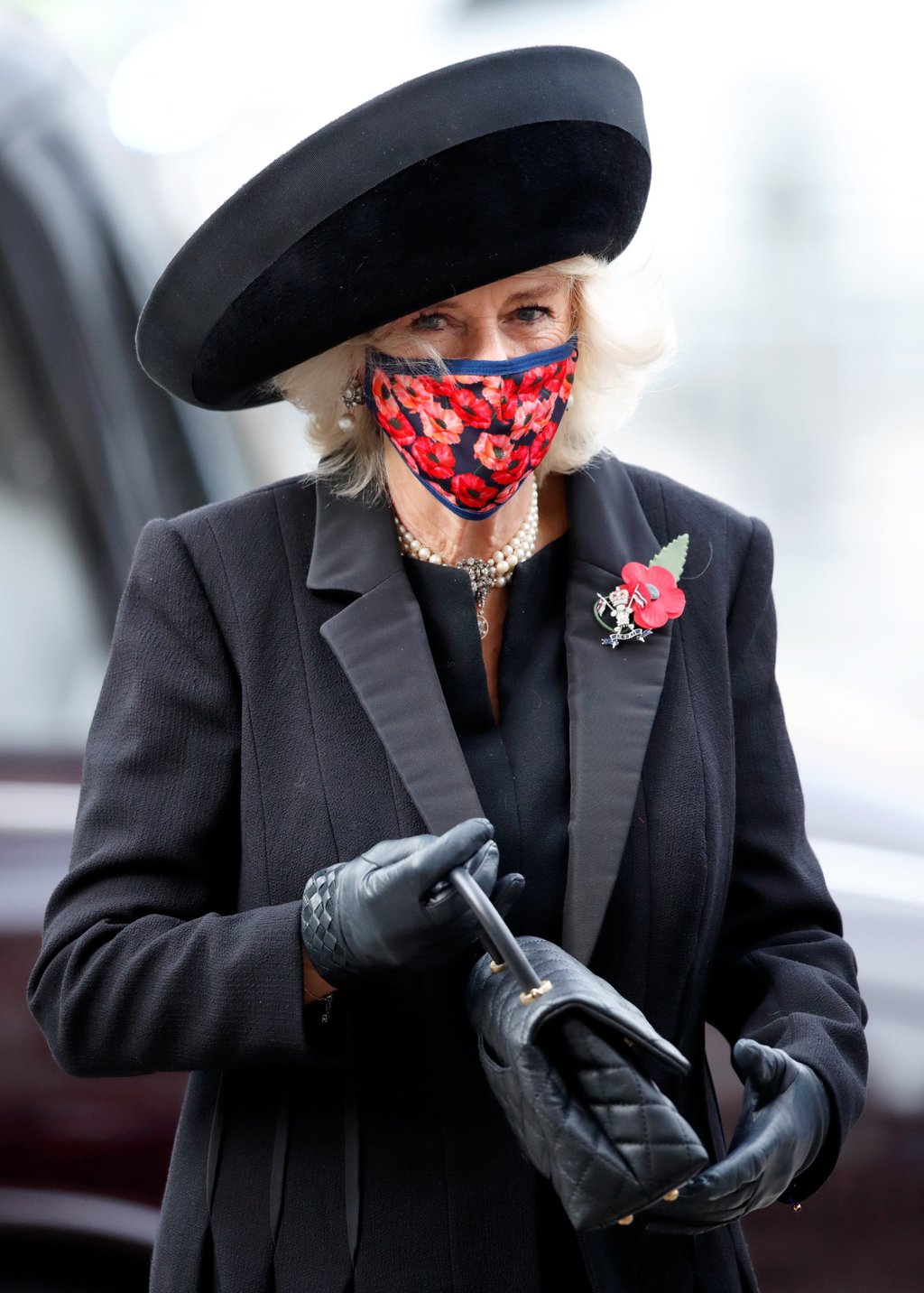 Camilla, then Duchess of Cornwall (seen wearing a poppy design face mask) attends a service to mark the centenary of the burial of the Unknown Warrior at Westminster Abbey in November 2020, in London, England. Photo: Getty Images