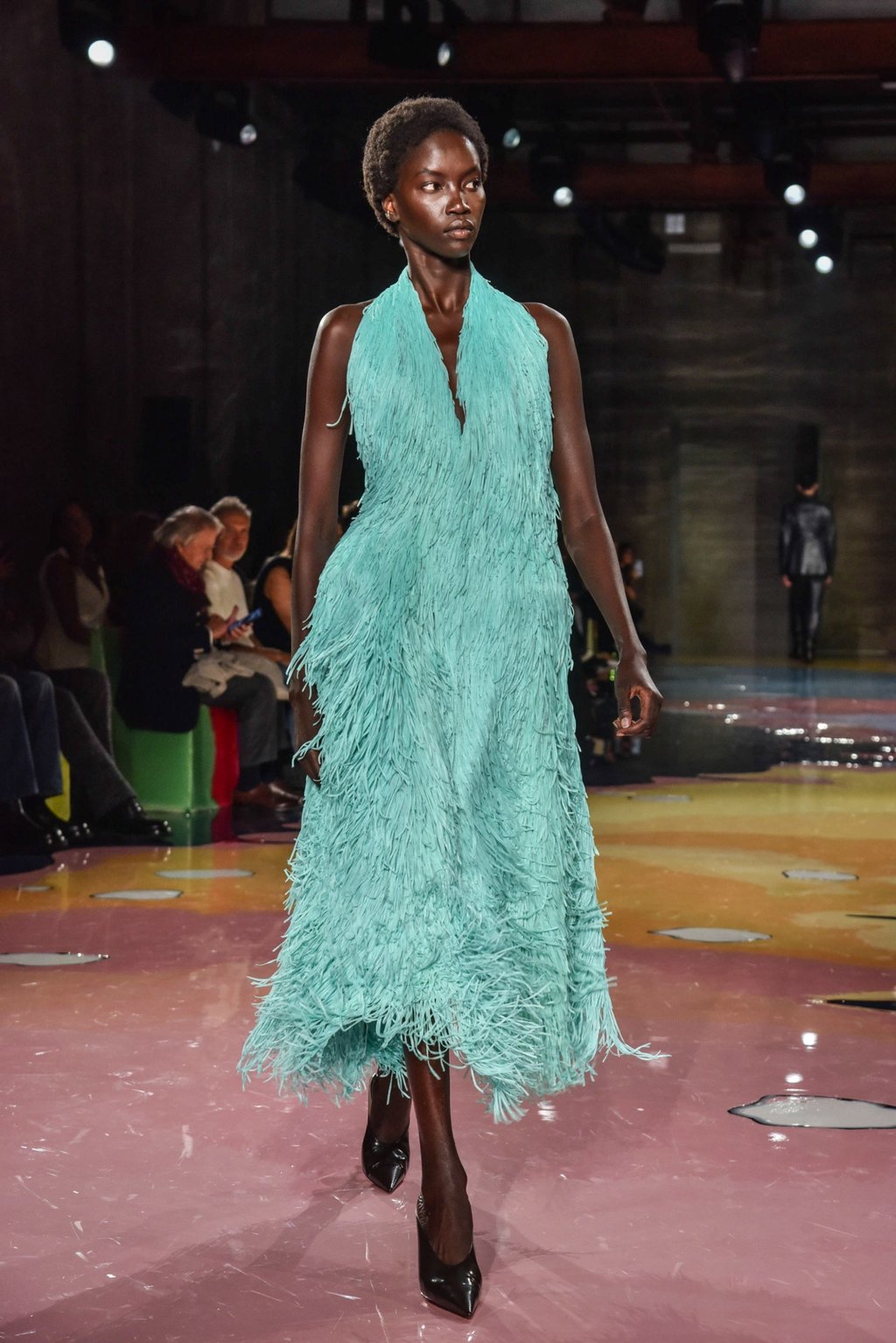 A model dons an ice blue dress by Bottega Veneta from its spring/summer 2023 collection presented during the Milan Fashion Week, in Milan, Italy, on September 24. Photo: EPA-EFE A model dons an ice blue dress by Bottega Veneta from its spring/summer 2023 collection presented during the Milan Fashion Week, in Milan, Italy, on September 24. Photo: EPA-EFE