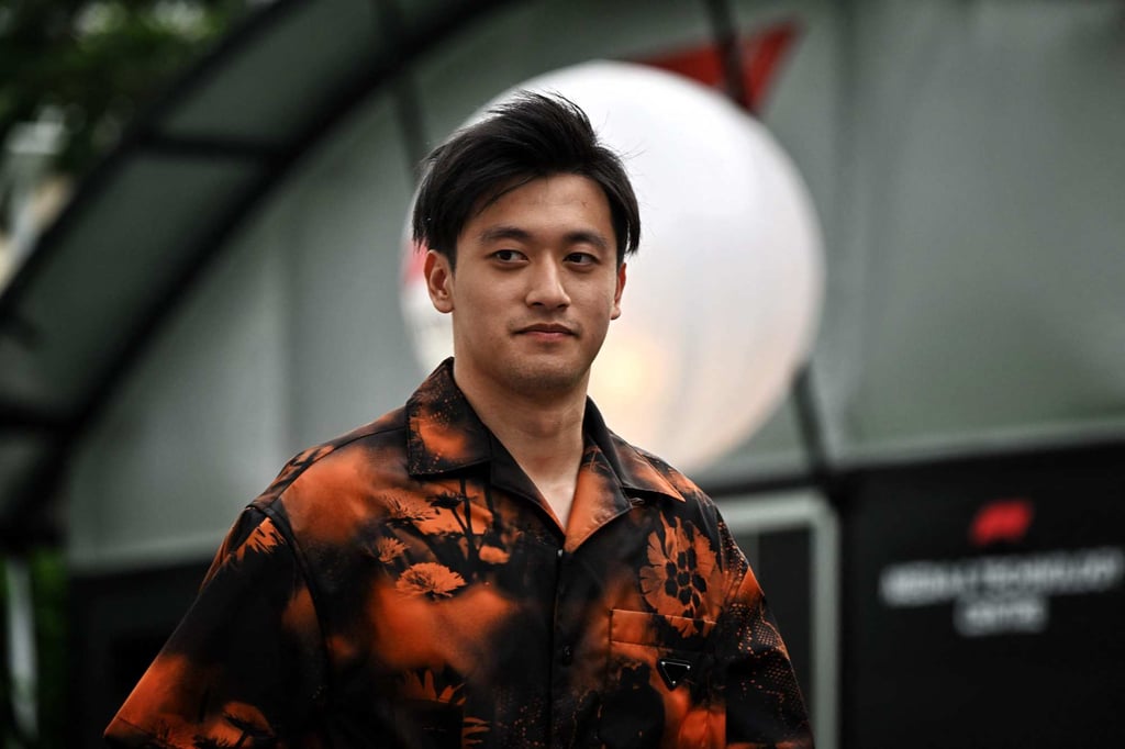 Alfa Romeo’s Chinese driver Zhou Guanyu enters the paddock ahead of the Singapore Grand Prix. Photo: AFP