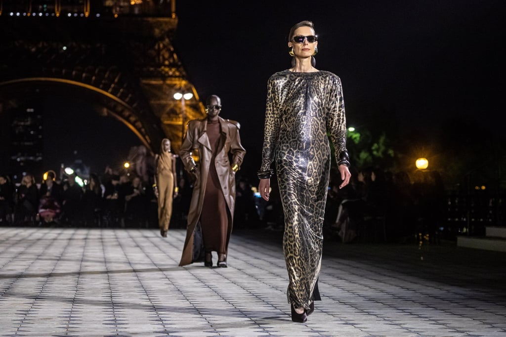 Models present creations from the spring/summer 2023 ready-to-wear collection by Saint Laurent fashion house during the Paris Fashion Week, in Paris, France, on September 27. Photo: EPA-EFE