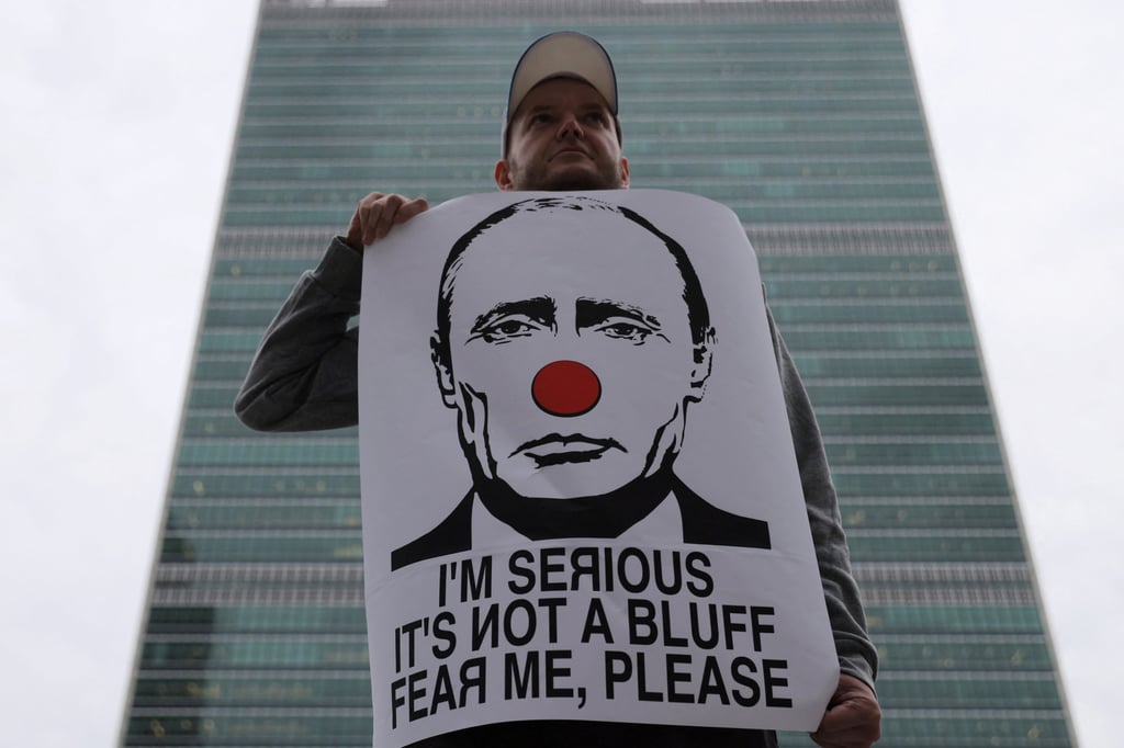 A protester against Russian President Vladimir Putin outside the United Nations on Friday after members of the UN Security Council voted on a resolution condemning the referendums on annexing several Russia-occupied regions of Ukraine. Photo: Reuters