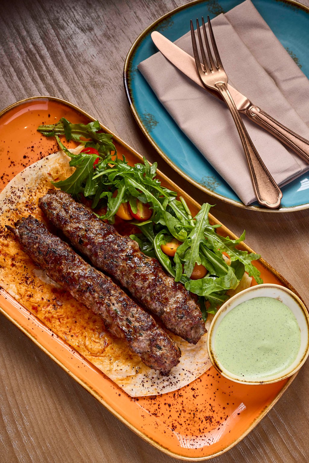 Arabic lamb kofta cooked over a charcoal grill. Photo: Mulino Arabic lamb kofta cooked over a charcoal grill. Photo: Mulino