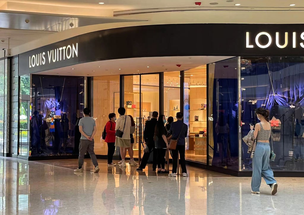 Residents lining up outside luxury boutiques at Shanghai’s IFC Mall as the city reopens. Photo: Handout Residents lining up outside luxury boutiques at Shanghai’s IFC Mall as the city reopens. Photo: Handout