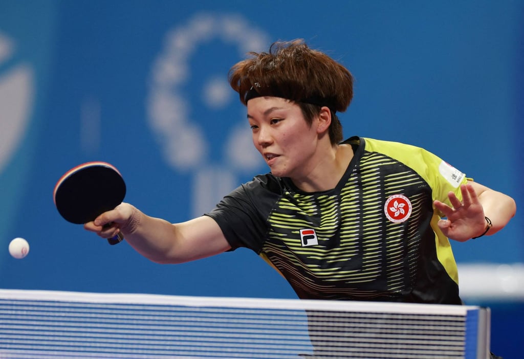 Hong Kong’s Doo Hoi-kem plays a shot against Brazil’s Giulia Takahashi. Photo: AFP
