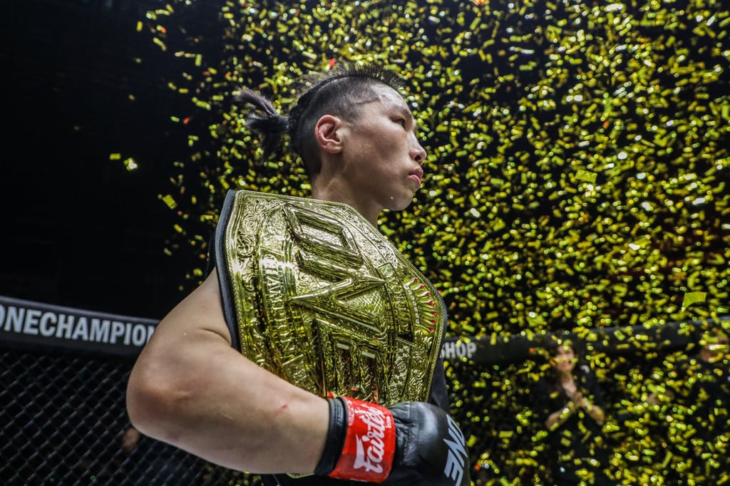 Xiong Jingnan looks on after defending the ONE Championship strawweight title with a decision victory over Angela Lee.
