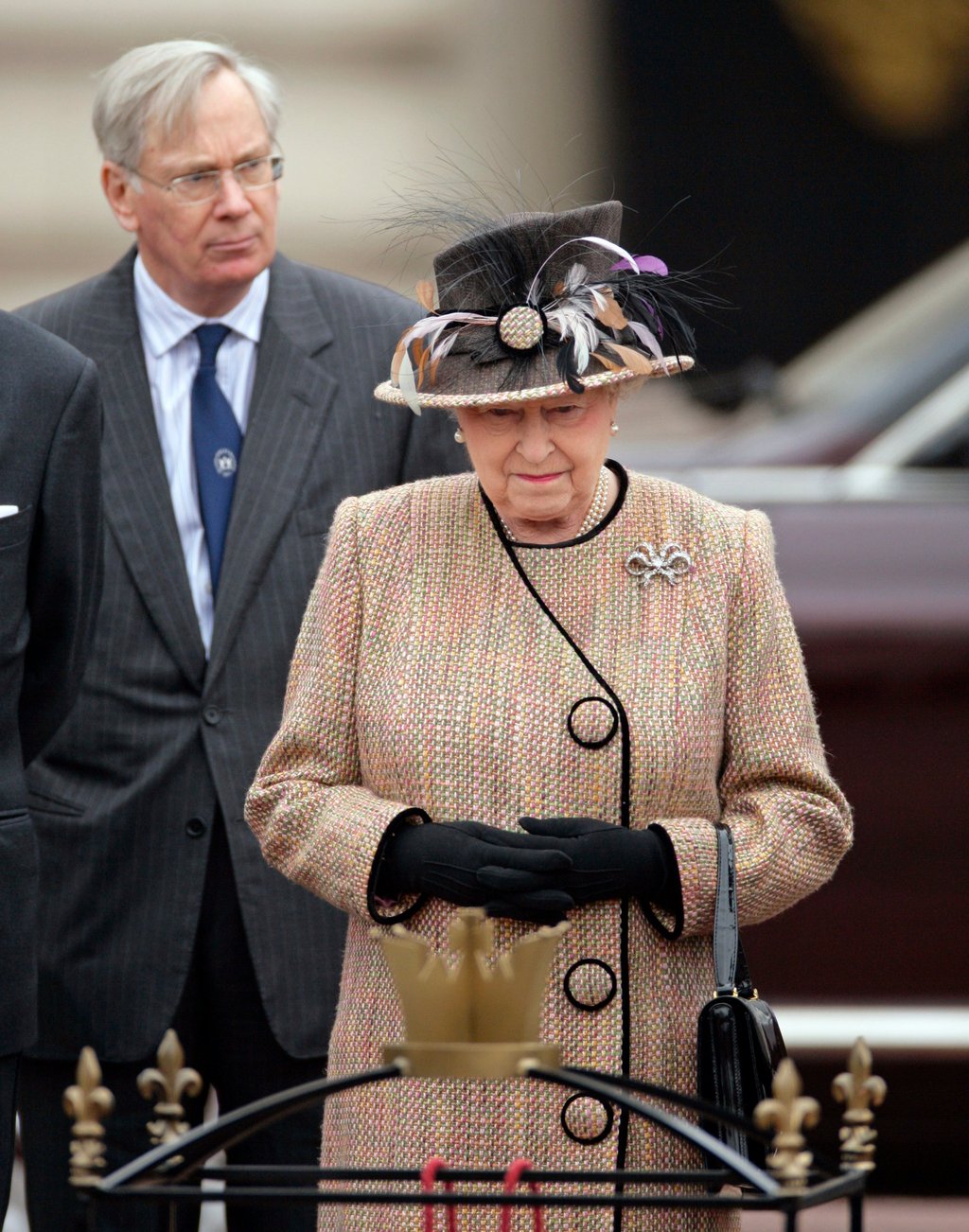 Prince Richard, the Duke of Gloucester, looks on as Queen Elizabeth prepares to unveil the first Jubilee Greenway Disc outside the central gates of Buckingham Palace on February 29, 2012 in London. Photo: Getty Images