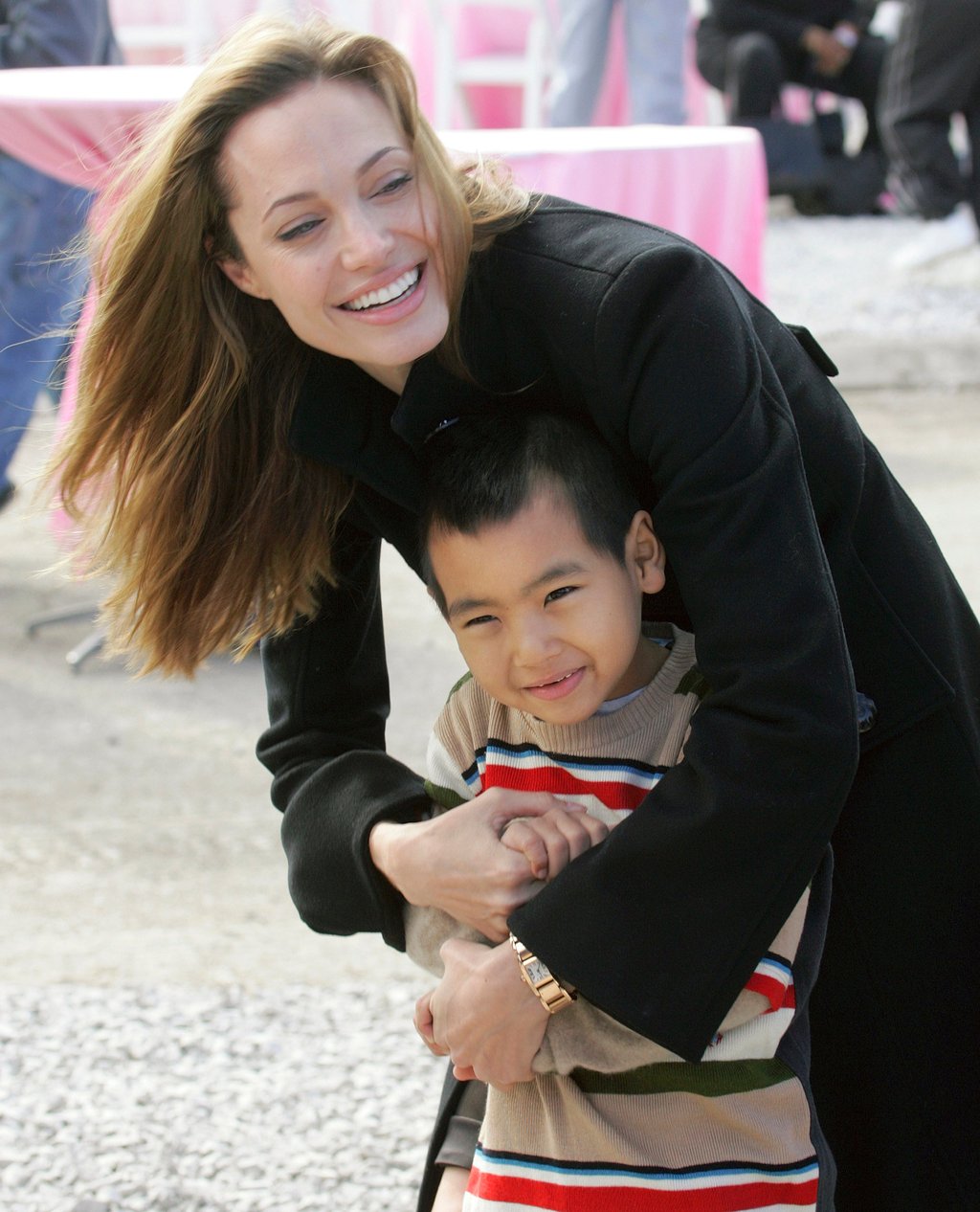 Actress Angelina Jolie talks to her son Maddox, her adopted child from Cambodia, in New Orleans’ Lower Ninth Ward in December 2007. Photo: AP