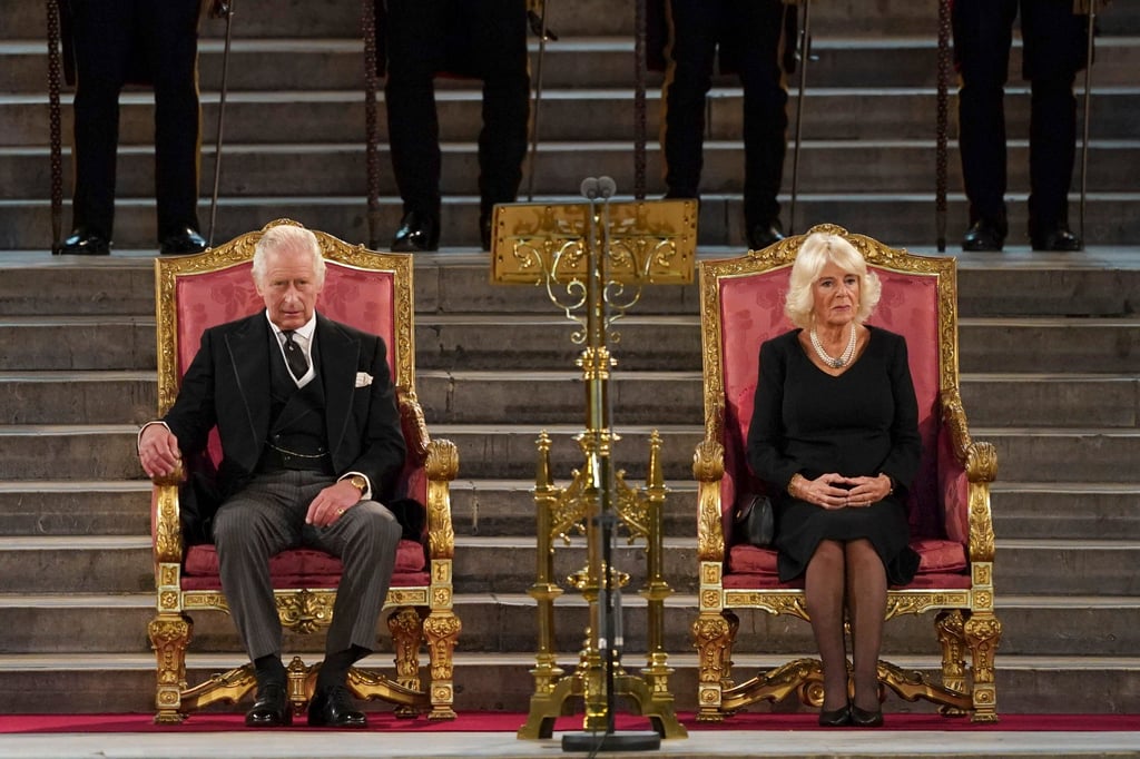 Britain’s King Charles, left, and Camilla, Queen Consort sit at Westminster Hall, where both Houses of Parliament are meeting to express their condolences following the death of Queen Elizabeth, at Westminster Hall, in London, on September 12. Photo: AP
