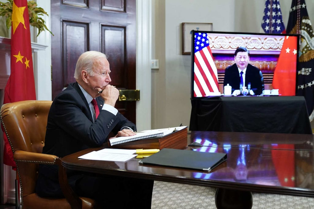 US President Joe Biden meets with China’s President Xi Jinping during a virtual summit from the Roosevelt Room of the White House in Washington DC on November 15, 2021. Former Indonesian leader Susilo Bambang Yudhoyono hopes Biden will meet his Russian and Chinese counterparts at the Bali G20 summit next month to stave off a “a real possibility of third world war”. Photo: AFP