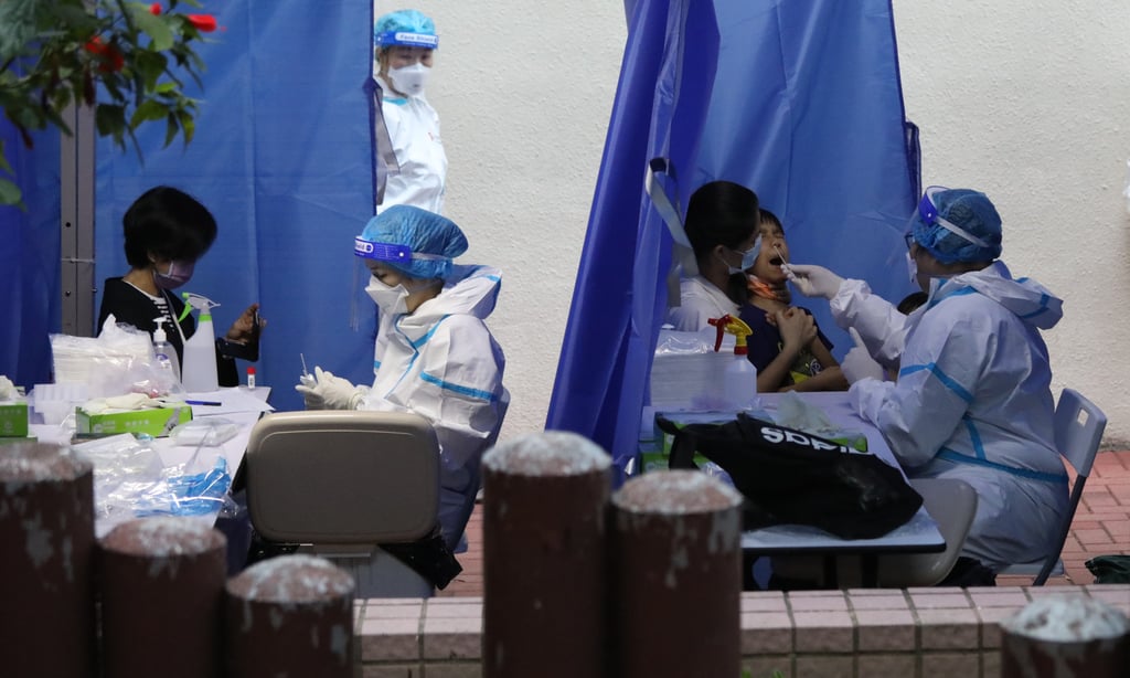 Residents in Sheung Shui undergo Covid-19 testing in March. Photo: Yik Yeung-man Residents in Sheung Shui undergo Covid-19 testing in March. Photo: Yik Yeung-man