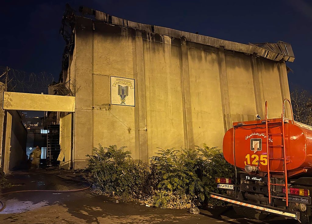 A charred building is seen after a fire on the property of the Evin prison, in Tehran, Iran. Photo: IRNA via AP A charred building is seen after a fire on the property of the Evin prison, in Tehran, Iran. Photo: IRNA via AP