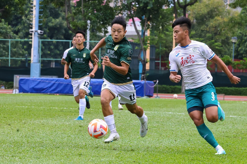 Sham Shui Po’s Timothy Wong (left) gives chase as Tai Po’s Chung Wai-keung goes on the attack. Photo: K. Y. Cheng