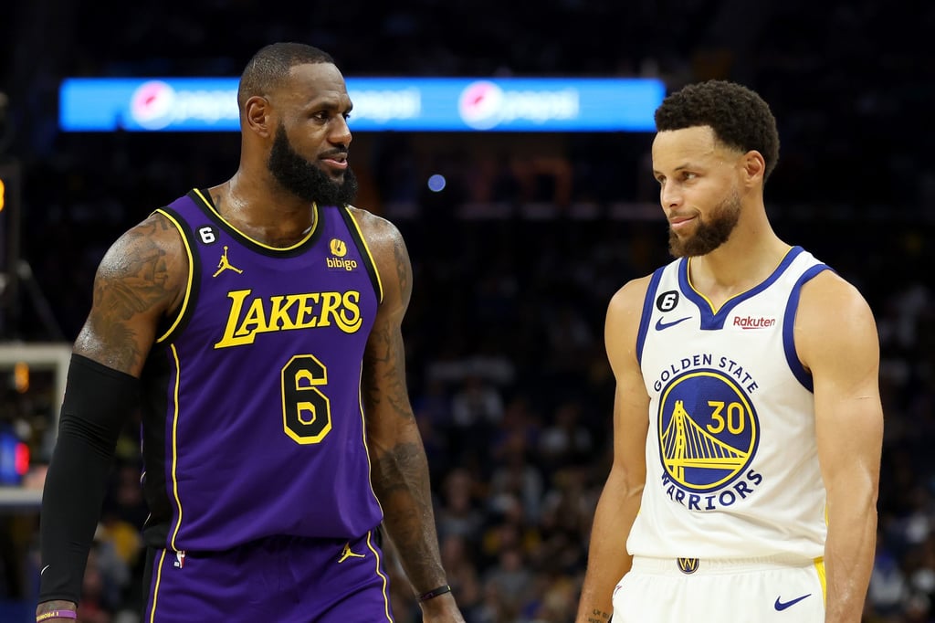 LeBron James of the Los Angeles Lakers speaks to Stephen Curry of the Golden State Warriors during their game at Chase Center in San Francisco. Photo: AFP LeBron James of the Los Angeles Lakers speaks to Stephen Curry of the Golden State Warriors during their game at Chase Center in San Francisco. Photo: AFP