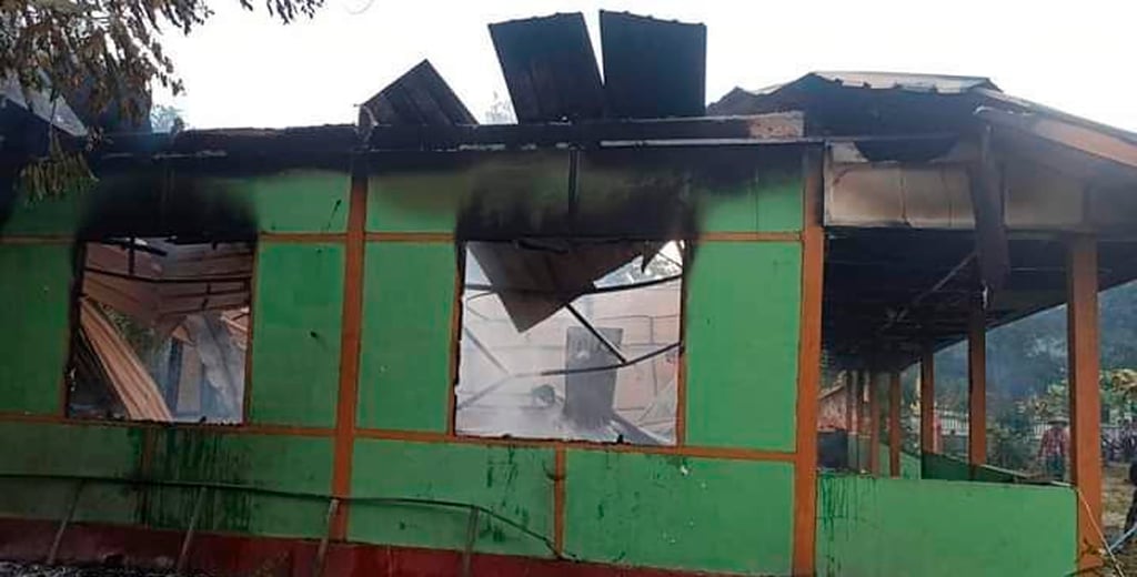The wall of a school structure is left standing after it was burned in Taung Myint village in the Magway region of Myanmar. Photo: AP