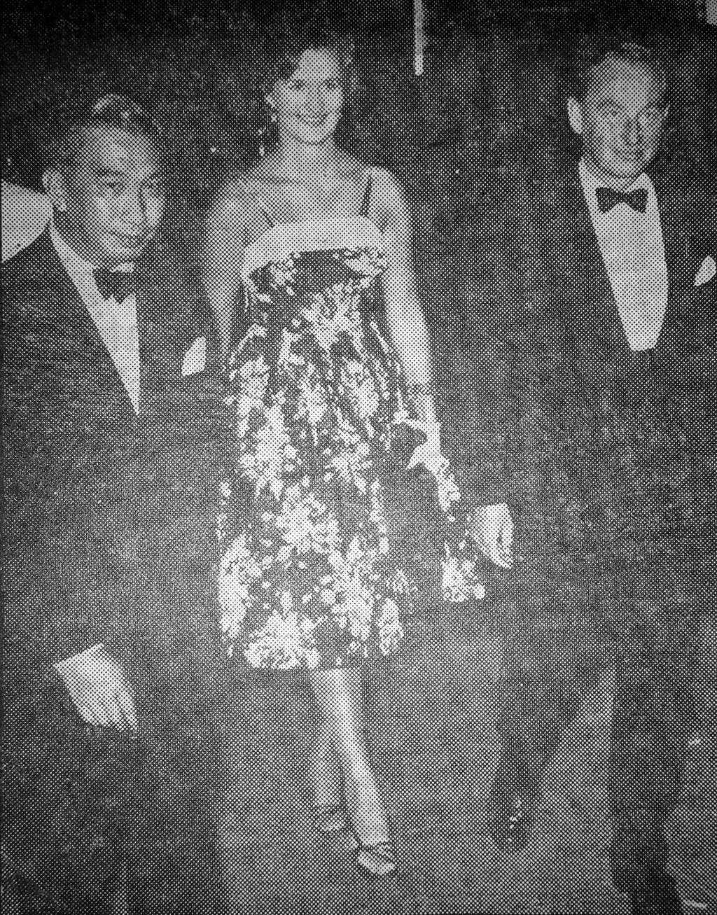 His Excellency the Officer Administering the Government Mr Claude Burgess and Mrs Burgess being escorted by Harold H.W. Lee, owner of the Lee Theatre, at the concert given by Vienna Philharmonic at the theatre on October 25, 1959. Photo: SCMP