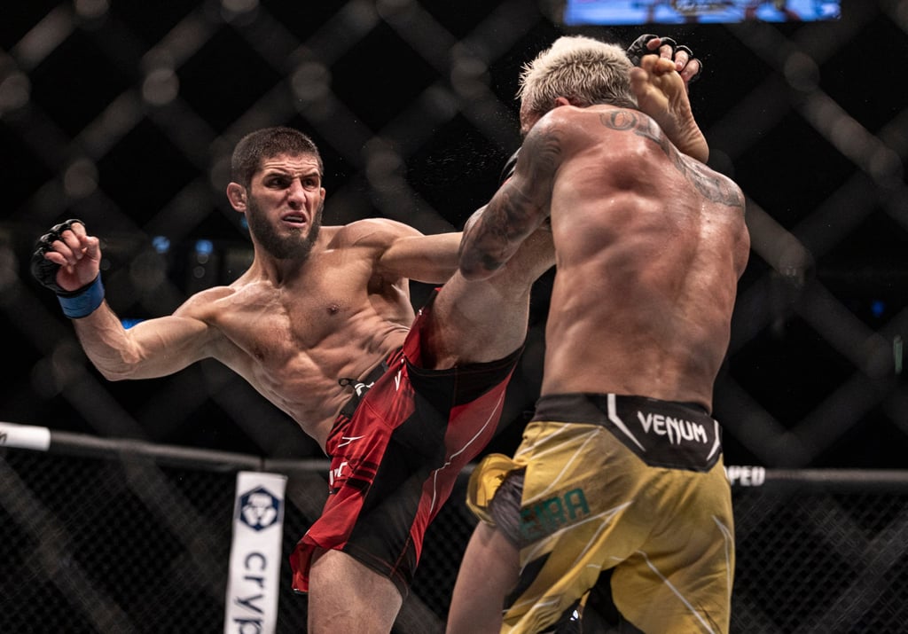 Islam Makhachev (left) connects with a kick to the head of Charles Oliveira during UFC 280 at Etihad Arena. Photo: USA TODAY Sports Islam Makhachev (left) connects with a kick to the head of Charles Oliveira during UFC 280 at Etihad Arena. Photo: USA TODAY Sports