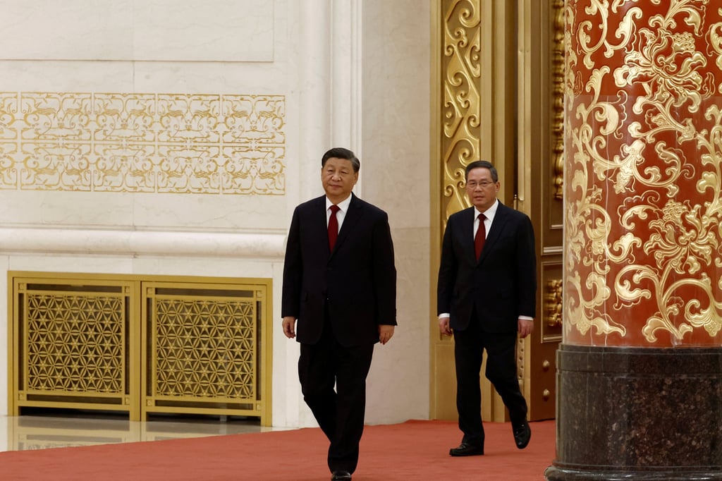 New Politburo Standing Committee members Xi Jinping and Li Qiang arrive to meet the media following the 20th National Congress of the Communist Party of China, at the Great Hall of the People in Beijing, China. Photo: Reuters New Politburo Standing Committee members Xi Jinping and Li Qiang arrive to meet the media following the 20th National Congress of the Communist Party of China, at the Great Hall of the People in Beijing, China. Photo: Reuters