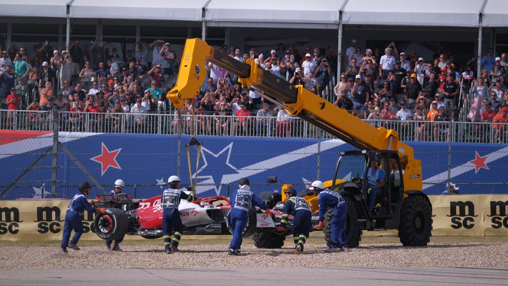 Valtteri Bottas’s Alfa Romeo is lifted away from the track at the US Grand Prix. Photo: dpa