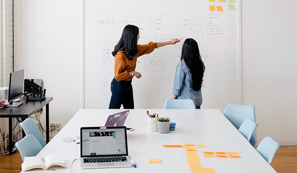 Global companies need to choose offices that inspire and engage their employees. Photo: Unsplash / Jason Goodman