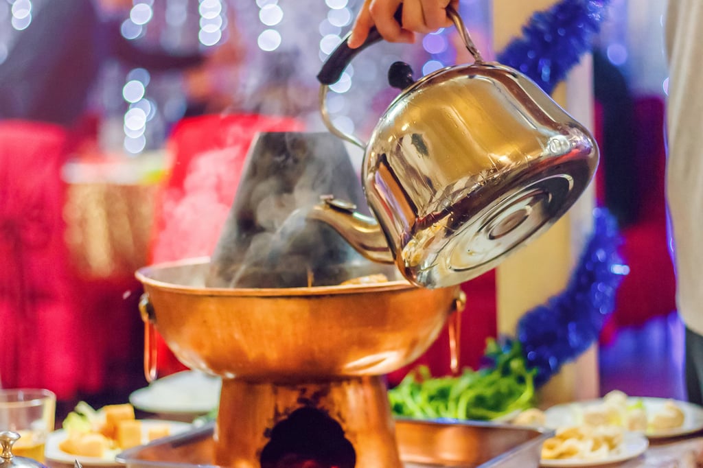 Hot water is commonly added to hotpot when the broth level gets low. Photo: Shutterstock