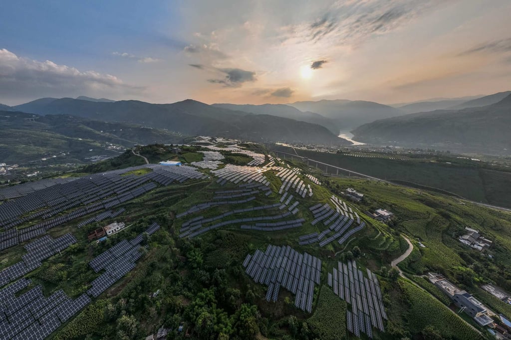China has successfully brought down the cost of wind and solar power in the past decade, but should reduce the supply of domestic carbon emission permits to drive up the cost of emissions, an AIIB executive says. Photo: AFP