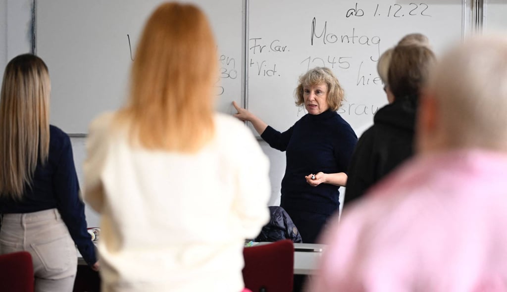 German teacher Petra Schulte gives a German language lesson to Ukrainian women refugees in Berlin, Germany earlier this month. Photo: AFP German teacher Petra Schulte gives a German language lesson to Ukrainian women refugees in Berlin, Germany earlier this month. Photo: AFP