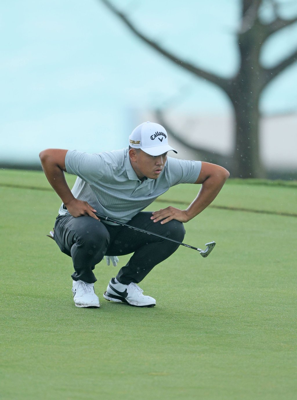 Kevin Yu lines up a putt on the ninth green during the second round of the Butterfield Bermuda Championship. Photo: AFP