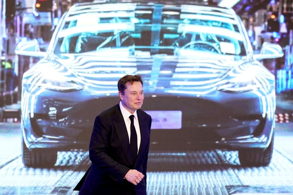 Tesla Inc. CEO Elon Musk walks next to a screen showing an image of Tesla Model 3 car during an opening ceremony for Tesla China-made Model Y programme in Shanghai, China, in January 2020. Photo: Reuters Tesla Inc. CEO Elon Musk walks next to a screen showing an image of Tesla Model 3 car during an opening ceremony for Tesla China-made Model Y programme in Shanghai, China, in January 2020. Photo: Reuters