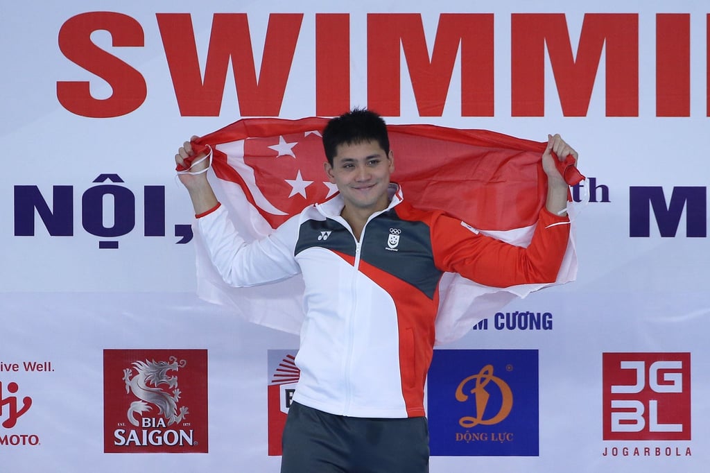 Gold medallist Joseph Schooling of Singapore celebrates during the medal ceremony for the Men 100m butterfly competition at the 31st Southeast Asian Games (SEA Games 31) in Hanoi, Vietnam in May. Photo: EPA-EFE