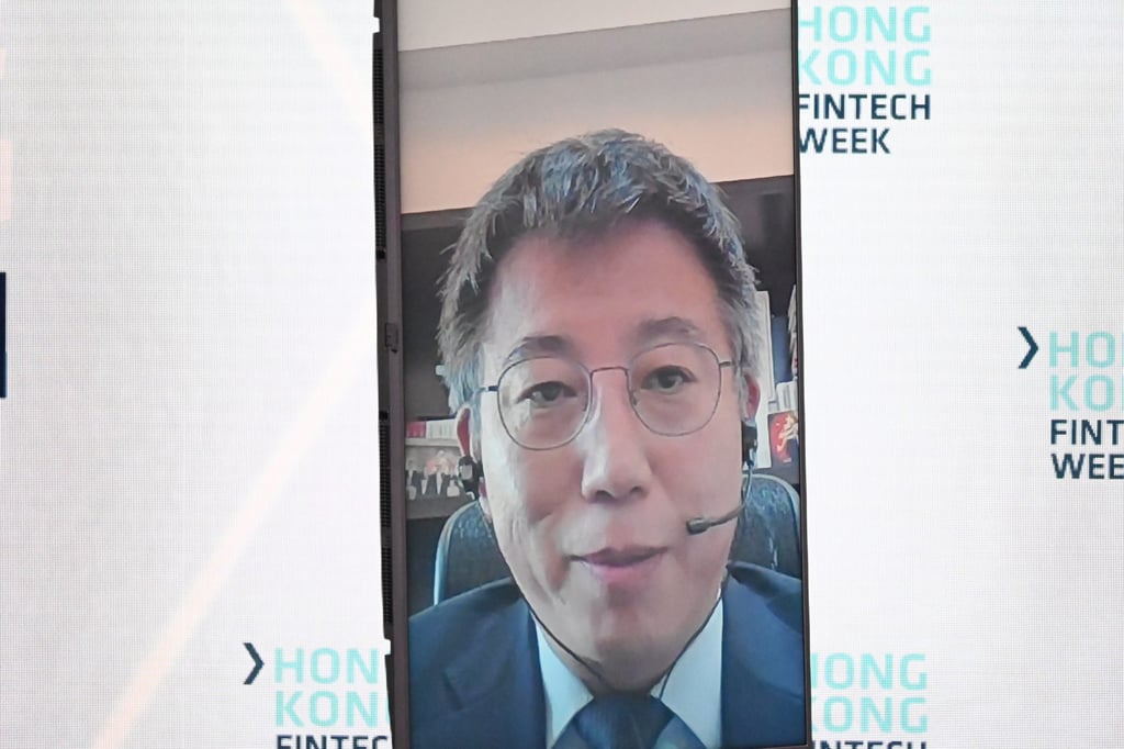 Mu Changchun, director general of the digital currency project at the People’s Bank of China, appearing remotely while speaking on a panel discussion about the cross-border digital currency settlements platform mBridge.