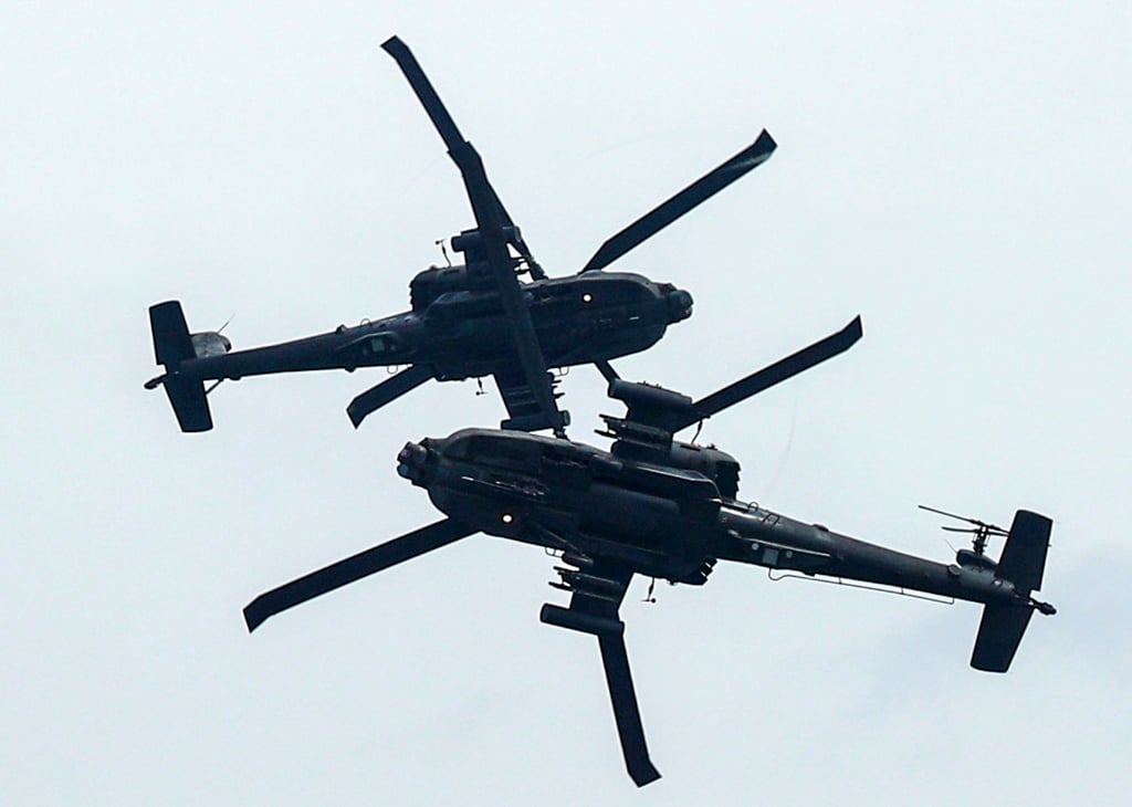 Helicopters of Singapore’s air force perform an aerial display in 2020. Cyberattacks are now seen as equally vital to defend against as those from the land, air or sea. Photo: Reuters