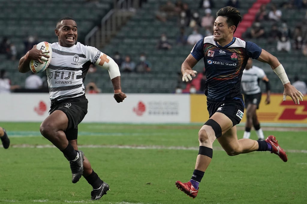 Fiji’s Waisea Nacuqu runs to score a try against Japan. Photo: AP