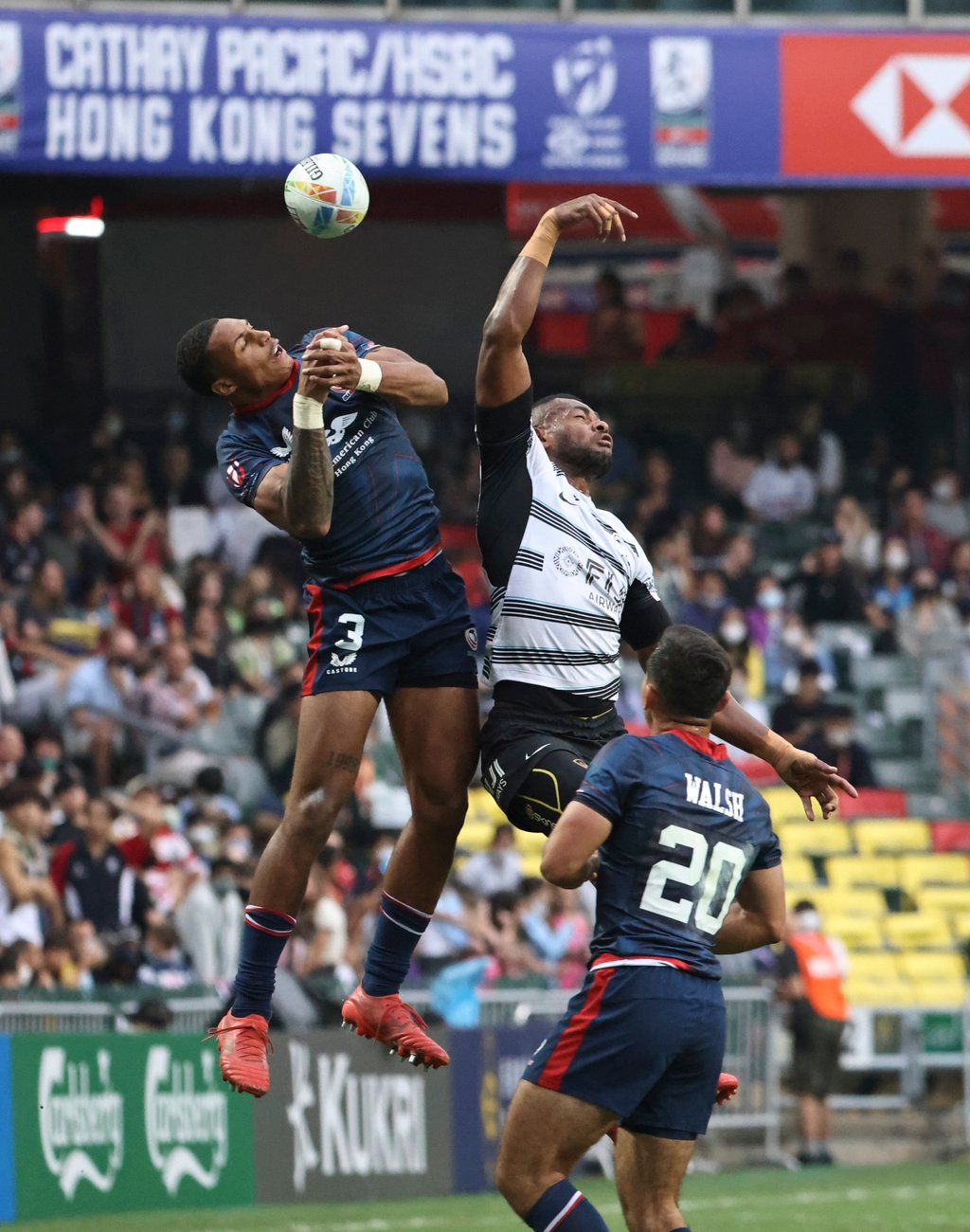 David Still (left) of Team USA challenges the Fiji on day 2. Fiji went on to hand USA a 24-0 thrashing. Photo: K.Y. Cheng David Still (left) of Team USA challenges the Fiji on day 2. Fiji went on to hand USA a 24-0 thrashing. Photo: K.Y. Cheng