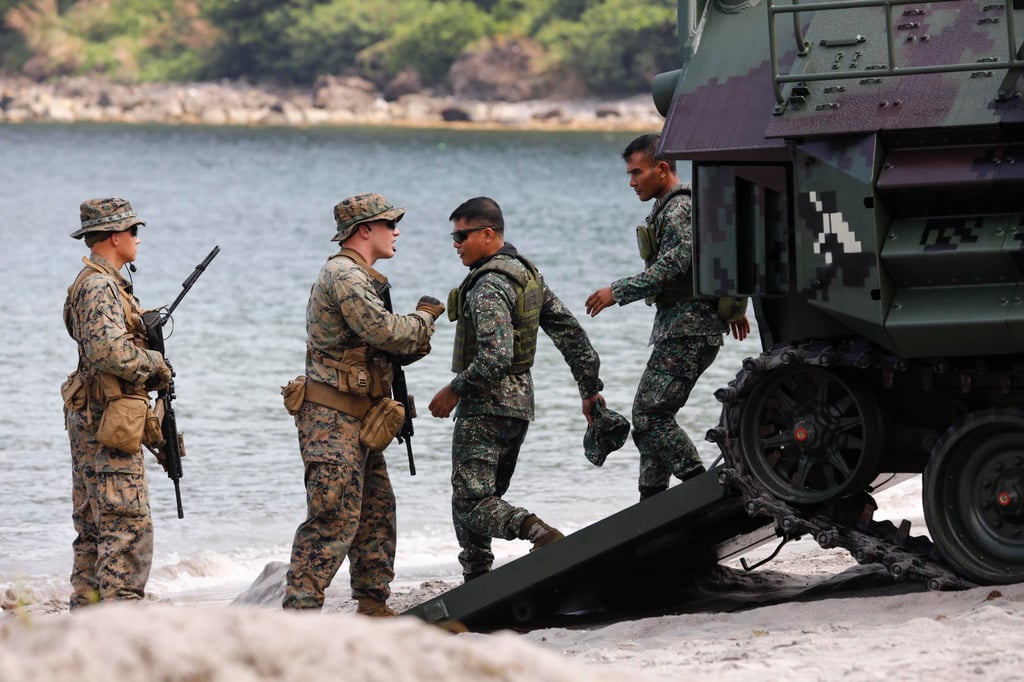US Marines talk to their Filipino counterparts during a joint military amphibious landing exercise held in the Philippines in 2019. Photo: EPA-EFE US Marines talk to their Filipino counterparts during a joint military amphibious landing exercise held in the Philippines in 2019. Photo: EPA-EFE