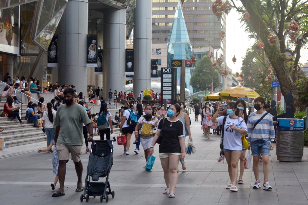 The crowds returned to Orchard Road after Singapore embarked on its strategy of “living with Covid-19”, backed by one of the world’s leading vaccine programmes. Photo: AP