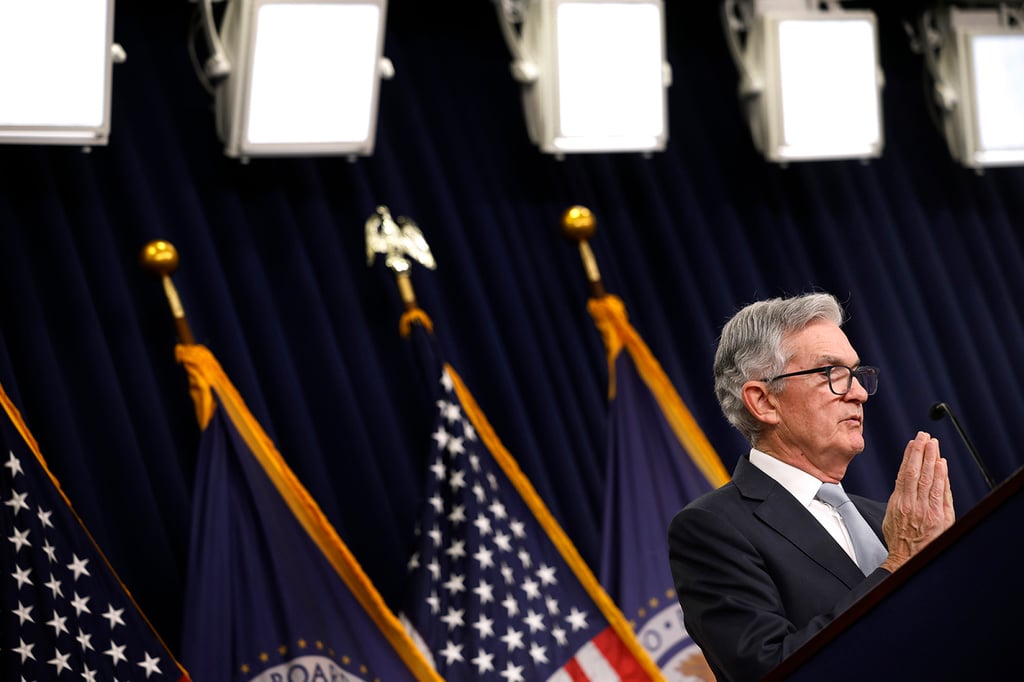 Federal Reserve Chair Jerome Powell answers questions at a media conference following another rate hike in November. Getty Images