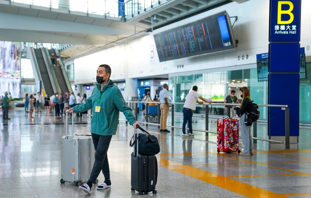 Passengers at the arrival hall of Hong Kong’s airport. Photo: Sam Tsang Passengers at the arrival hall of Hong Kong’s airport. Photo: Sam Tsang