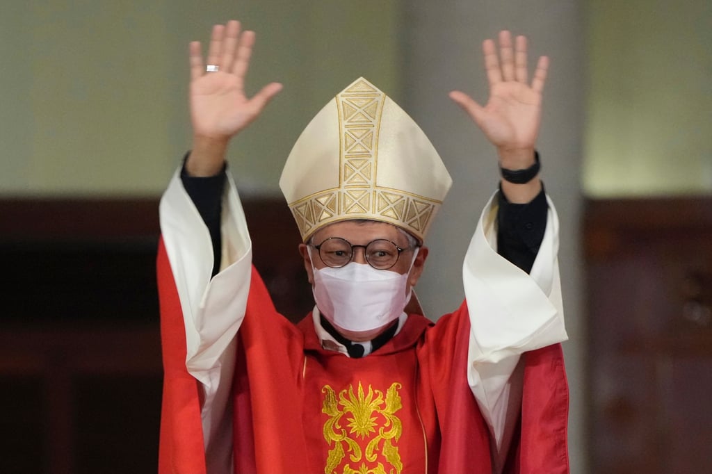 Stephen Chow waves at the episcopal ordination ceremony as the new bishop of the Catholic Diocese, in Hong Kong in 2021. Photo: AP Stephen Chow waves at the episcopal ordination ceremony as the new bishop of the Catholic Diocese, in Hong Kong in 2021. Photo: AP