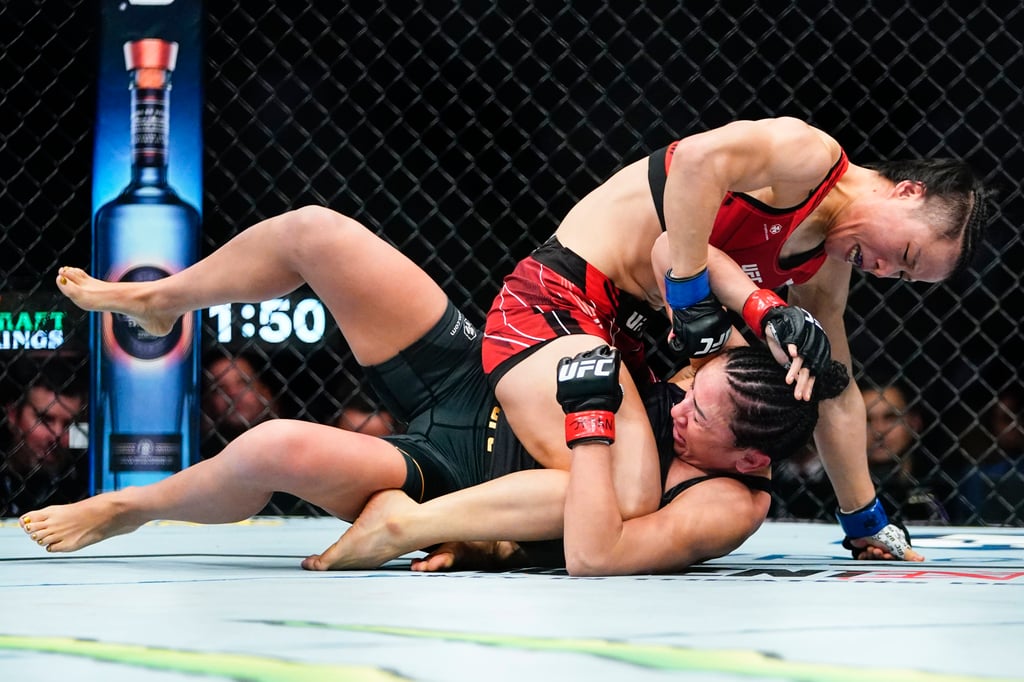 China’s Zhang Weili, punches Carla Esparza during the second round. Photo: AP China’s Zhang Weili, punches Carla Esparza during the second round. Photo: AP