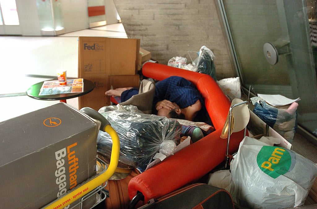 Mehran Karimi Nasseri sleeps in terminal 1 of Paris Charles De Gaulle airport in 2004. Photo: AFP