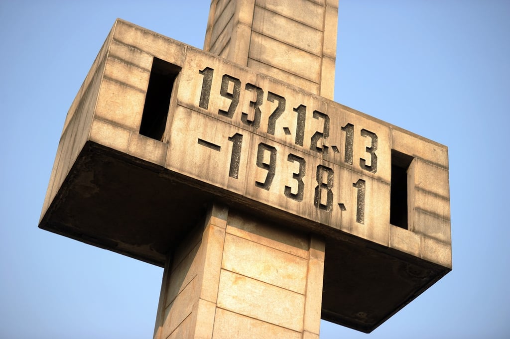 A giant cross with the dates of the massacre at a museum dedicated to the memory of the dead in Nanjing. Photo: AFP. A giant cross with the dates of the massacre at a museum dedicated to the memory of the dead in Nanjing. Photo: AFP.
