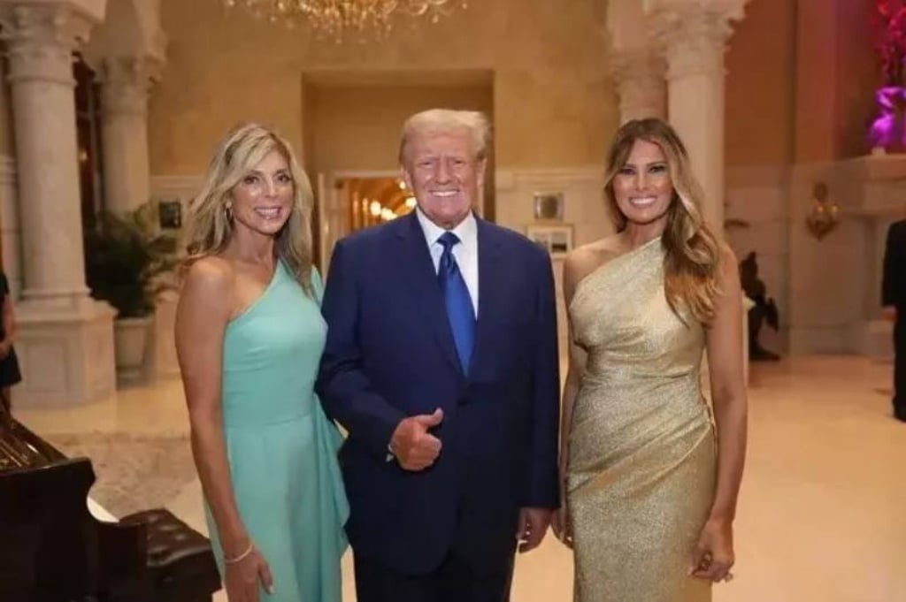 Donald Trump (centre), his second wife Marla Maples and his current wife Melania Trump pose for a photo. Photo: Denis Leon & Co.