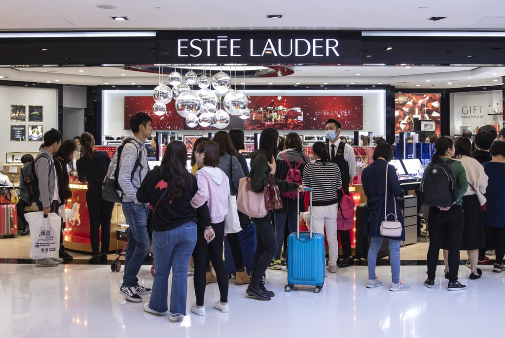Shoppers stand in line outside an Estée Lauder Companies Inc. store inside New Town Plaza shopping centre, operated by Sun Hung Kai Properties Ltd., in Hong Kong, in December 2018. Photo: Bloomberg Shoppers stand in line outside an Estée Lauder Companies Inc. store inside New Town Plaza shopping centre, operated by Sun Hung Kai Properties Ltd., in Hong Kong, in December 2018. Photo: Bloomberg