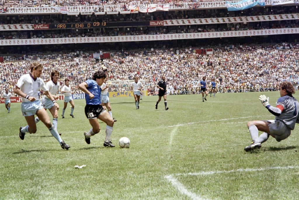 Diego Maradona runs past English defender Terry Butcher on his way to scoring his ‘goal of the century’ during the World Cup quarter final football match between Argentina and England in Mexico City in 1986. Photo: AFP Diego Maradona runs past English defender Terry Butcher on his way to scoring his ‘goal of the century’ during the World Cup quarter final football match between Argentina and England in Mexico City in 1986. Photo: AFP