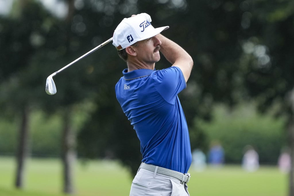Wade Ormsby of Punch GC plays an approach shot on the 14th hole during the team championship stroke-play round of the LIV Golf Invitational – Miami at Trump National Doral Miami. Photo: AFP